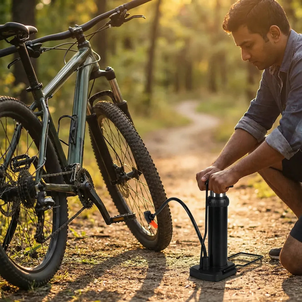Portable foot-activated bike pump - automotive
