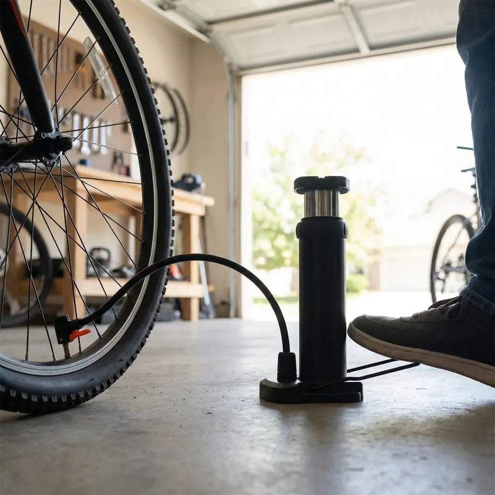 Portable foot-activated bike pump - automotive