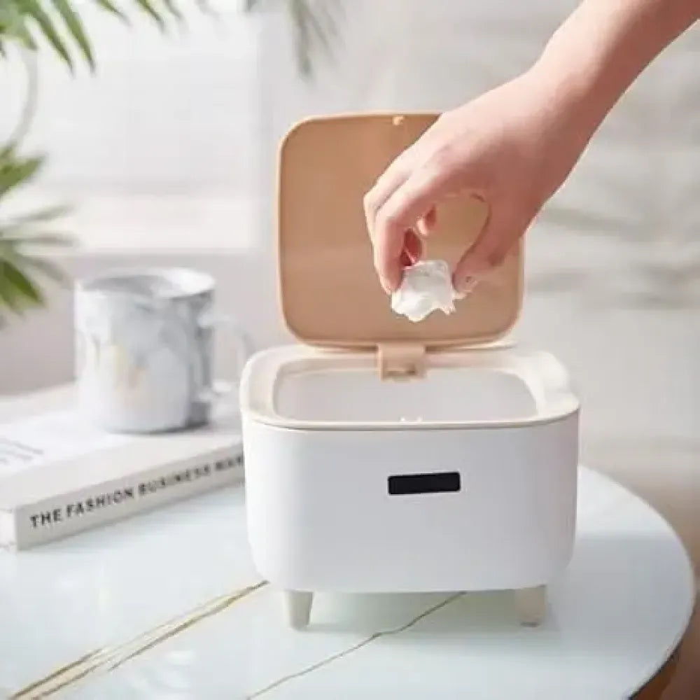 Push-button desk bin
