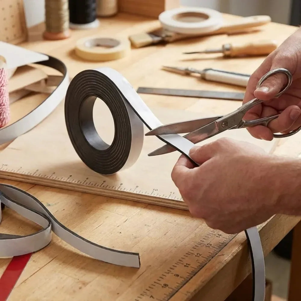 Self adhesive magnetic tape