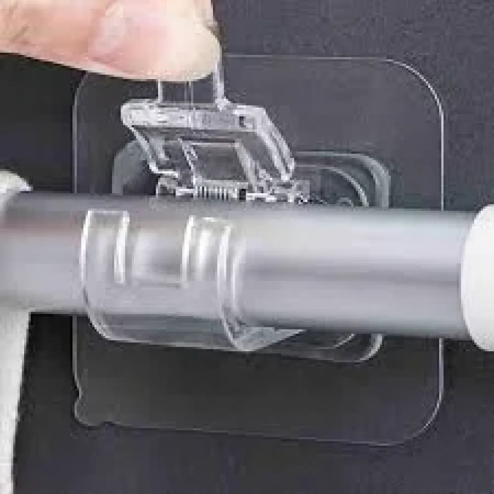 Self adhesive rod clips