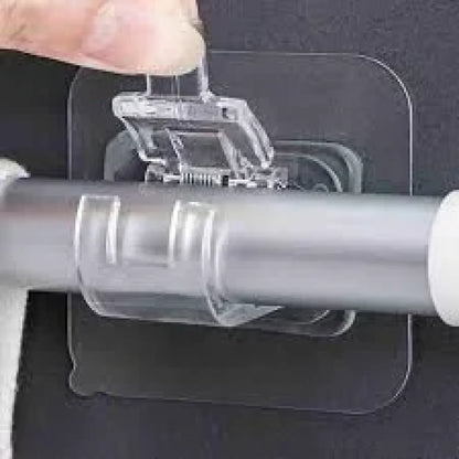Self adhesive rod clips