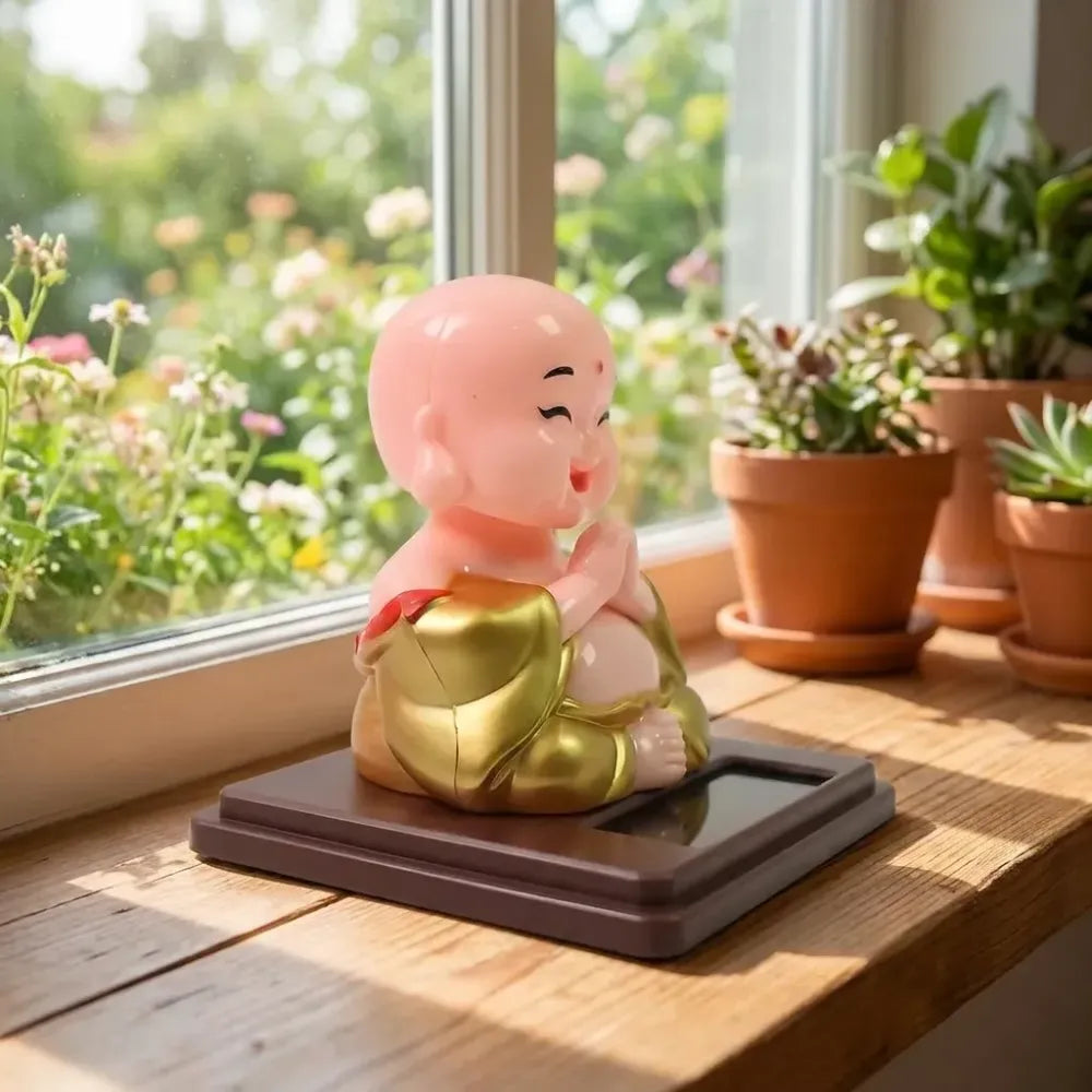 Solar-powered nodding buddha ornament - automotive