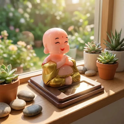 Solar-powered nodding buddha ornament - automotive