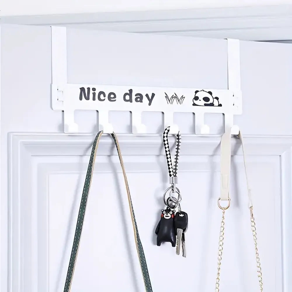Space-saving over-door hanger - home improvement
