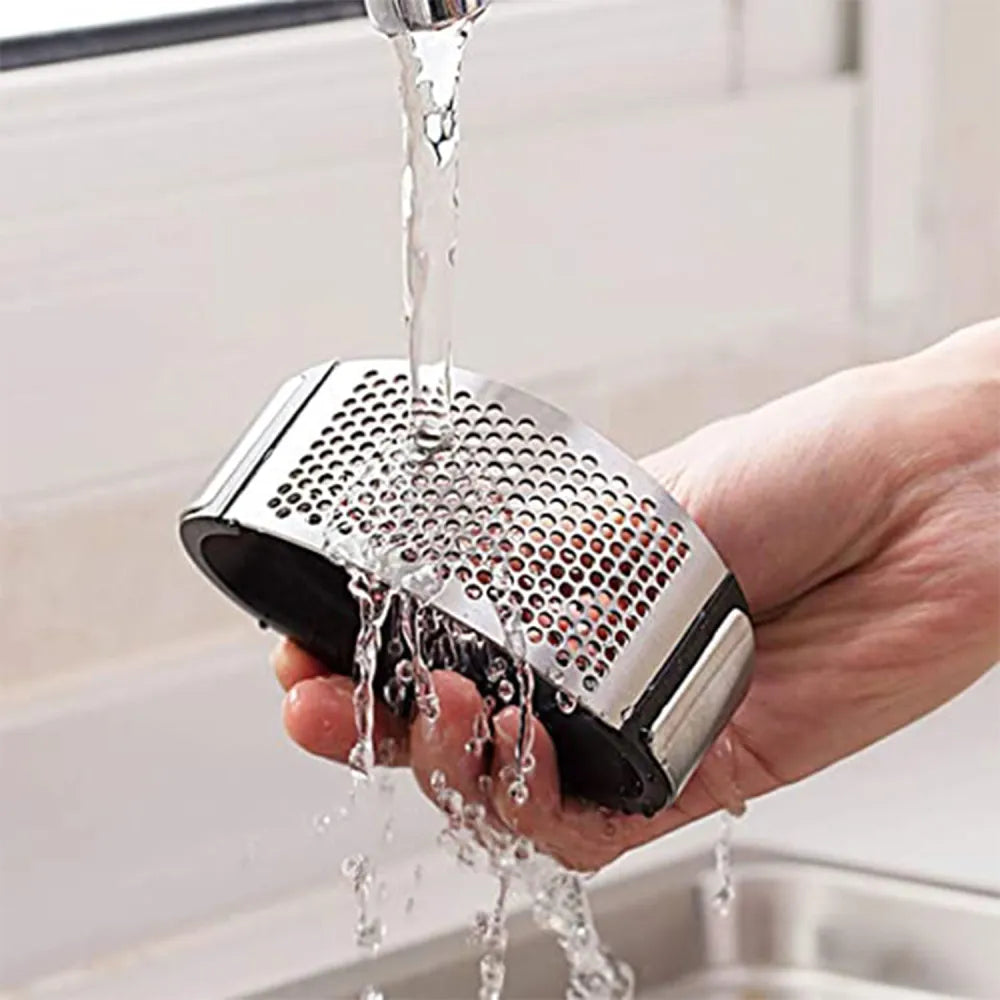 Stainless steel garlic crusher - kitchen tool