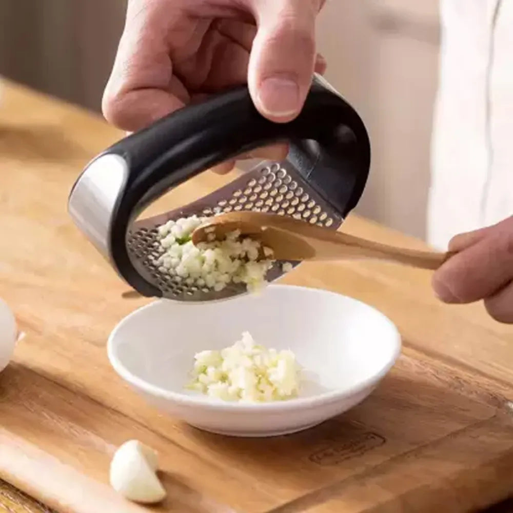 Stainless steel garlic crusher - kitchen tool