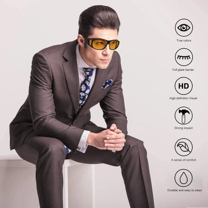 Man in a suit wearing yellow-tinted glasses.