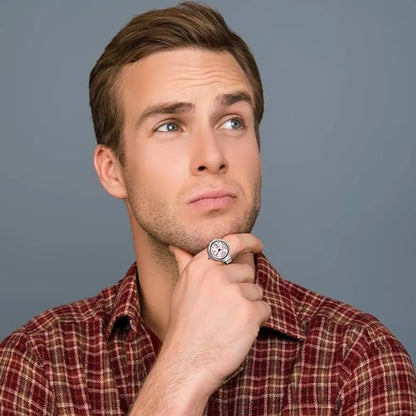 Pensive man with a ring.