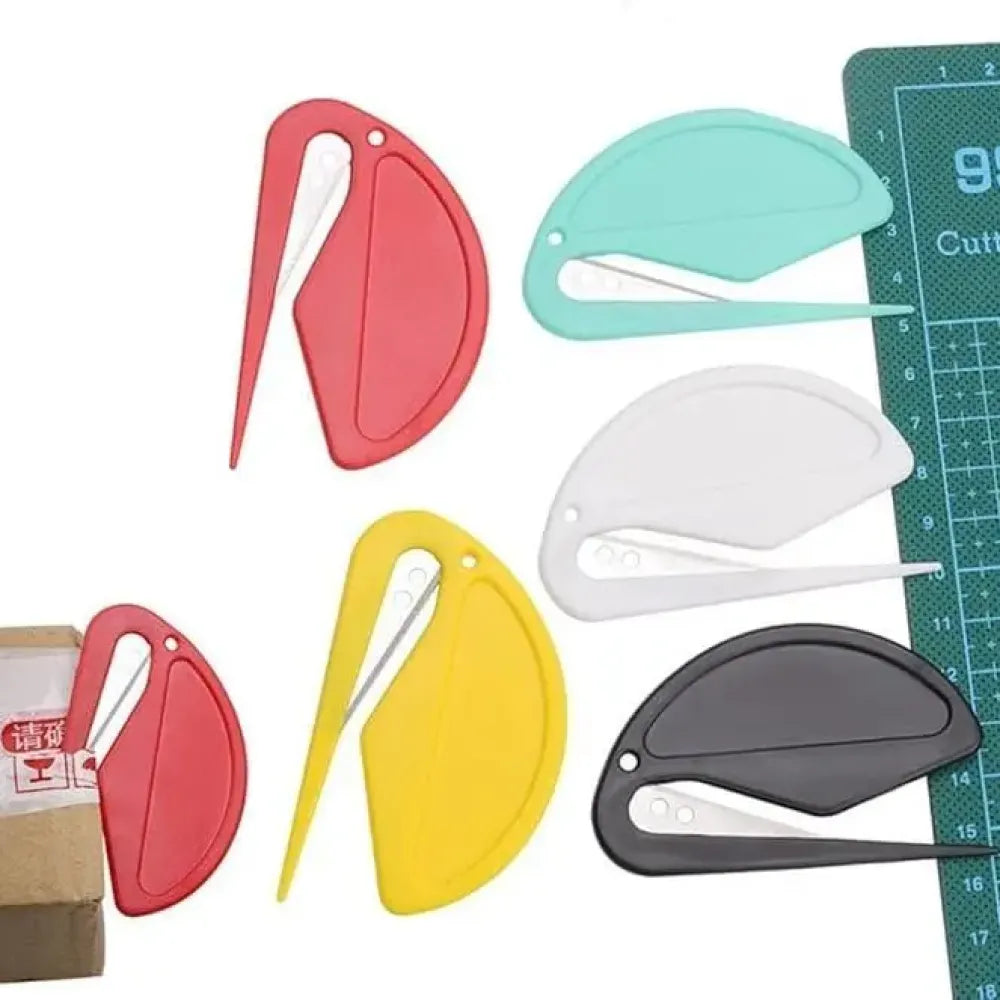 Wrapping paper roll cutter