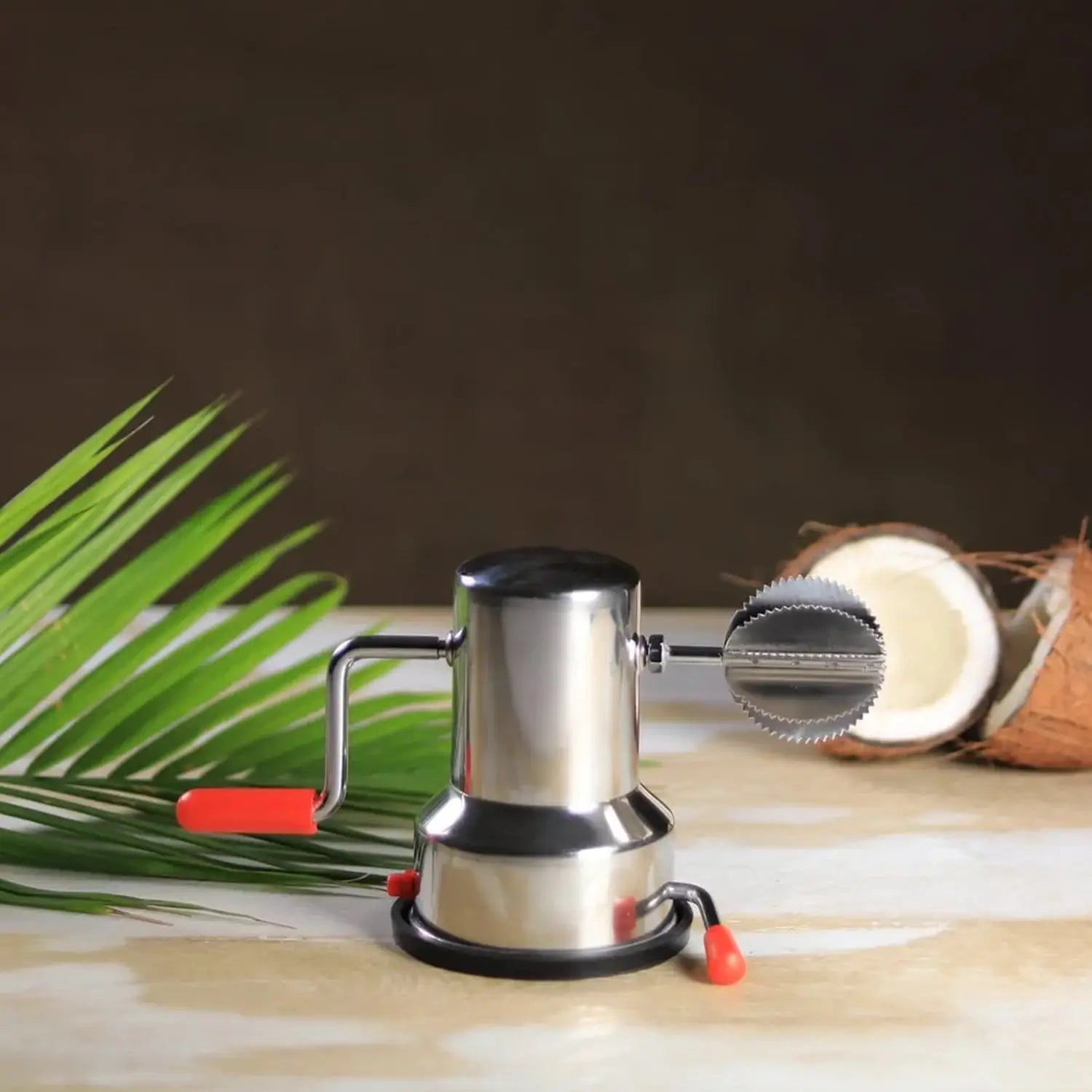 Steel coconut scraper
